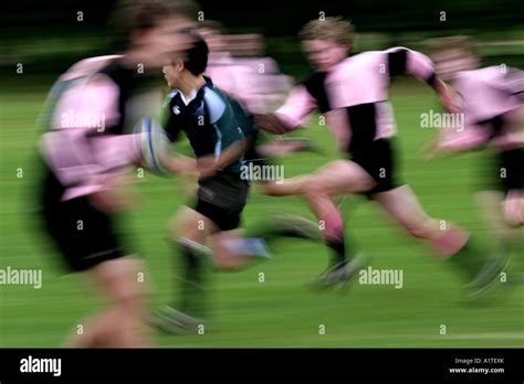 Rugby in motion Stock Photo - Alamy