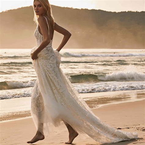 35 Beach Wedding Dresses Perfect for a Seaside Ceremony