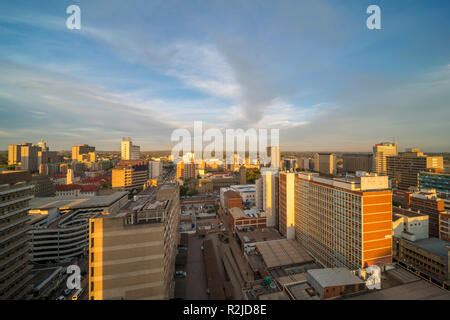 A sunset is seen over the Harare city skyline in Zimbabwe Stock Photo - Alamy