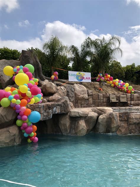 Balloon Garlands around Pool | Balloon garland, Tutti fruity party ...