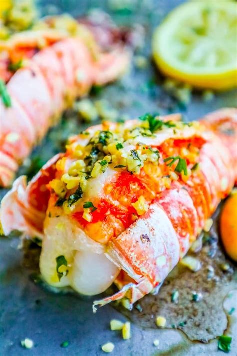 two lobster tails sitting on baking sheet oven recipe | Lobster recipes ...