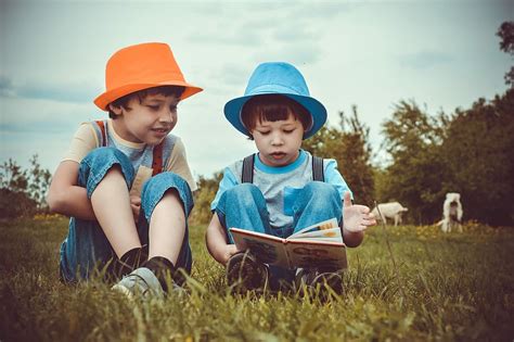 two, boys reading book, sitting, green, grass field, two boys, 2 children, read, CC0, public ...