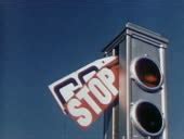 1952 low angle close up "go" sign lowering and "stop" sign raising on... Stock Footage Video ...