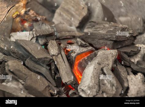 Firing coal on the grill. Barbecue Fire Grill top view Stock Photo - Alamy