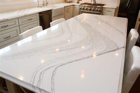 This quartz island provides an attractive center piece to this kitchen.