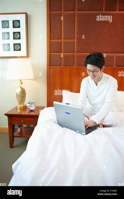 man working on the bed Stock Photo - Alamy