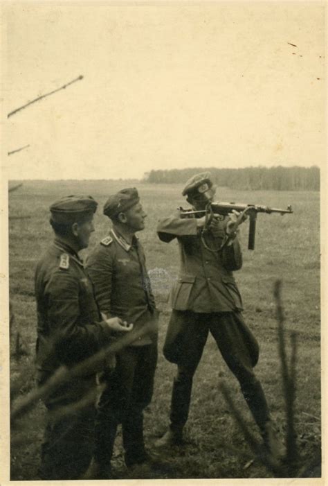 MP-40 in action, WWII era. : r/True_WWII_Pics