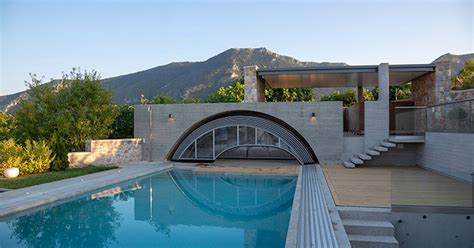 swimming pool in mountainous central greece follows design principles ...