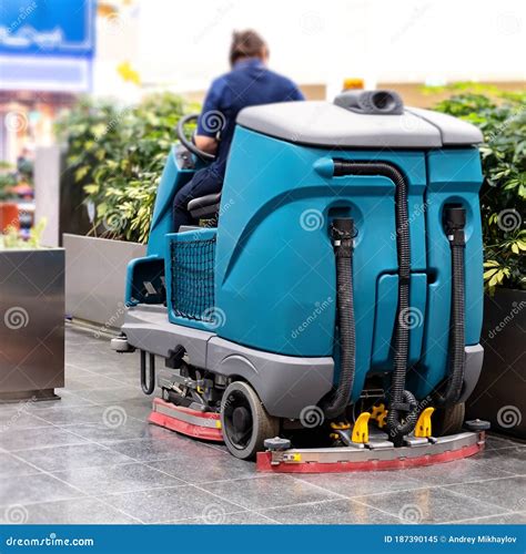 Cleaning Machine for Sanitation in the Supermarket. Behind the Wheel Cleaner. Stock Image ...