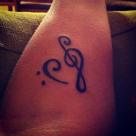 New tattoo! Treble clef and bass clef!! | Tattoos, New tattoos, Fish tattoos