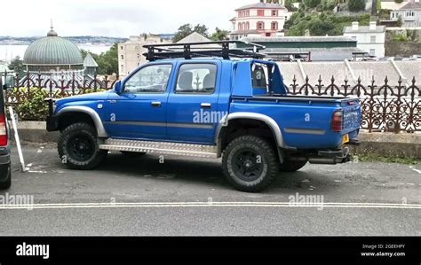 A 1999 blue Toyota Hilux pick up truck parked up in Torquay, Devon ...