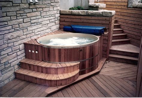 An indoor hot tub. Our small oval and round cedar hot tubs don't require too much space so you ...