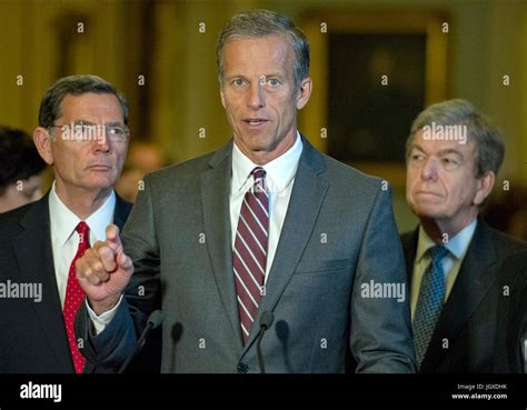 United States Senator John Thune (Republican of South Dakota), center, speaks to reporters ...