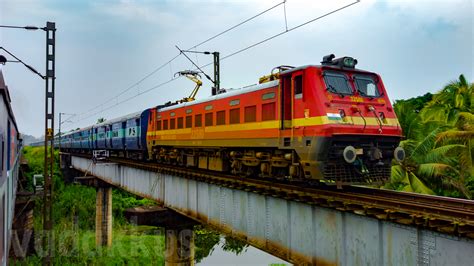 The Parasuram Express on a Girder Bridge in a Wet and Green Kerala | Fottams!