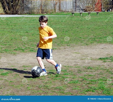 Boy Playing Soccer Stock Photography - Image: 748242