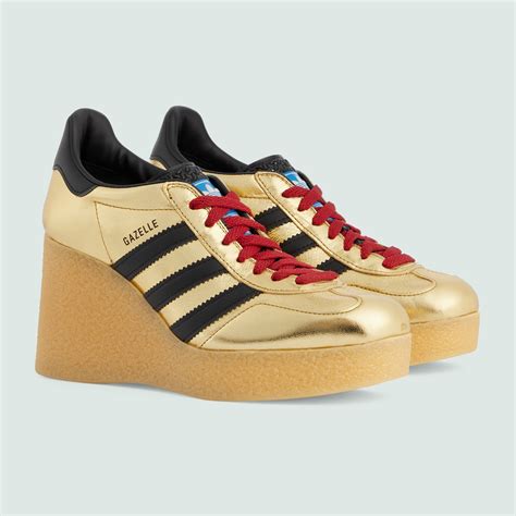 adidas x Gucci wedge Gazelle sneaker in metallic gold leather | GUCCI ...