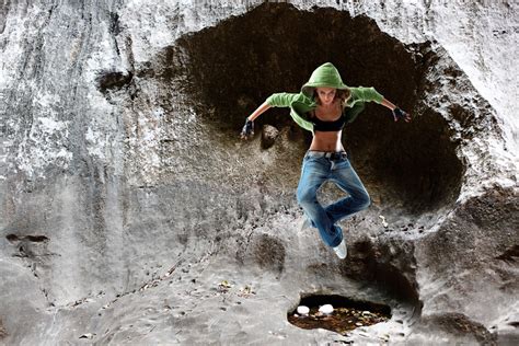 Free Images : rock, person, girl, adventure, dance, cave, jeans, sneaker, mud, puddle, action ...