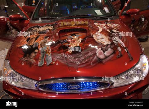 Custom paint job on a car hood comic character Stock Photo - Alamy