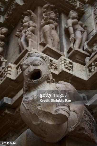 Khajuraho Temple Sculptures Photos and Premium High Res Pictures ...