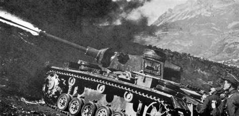 Flammenpanzer III flamethrower tank from the German 44th Infantry Division in action. Date ...