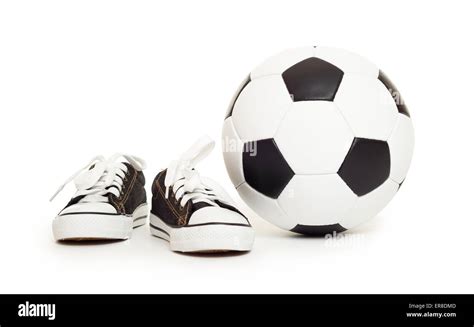 soccer ball and sport shoes on white isolated Stock Photo - Alamy