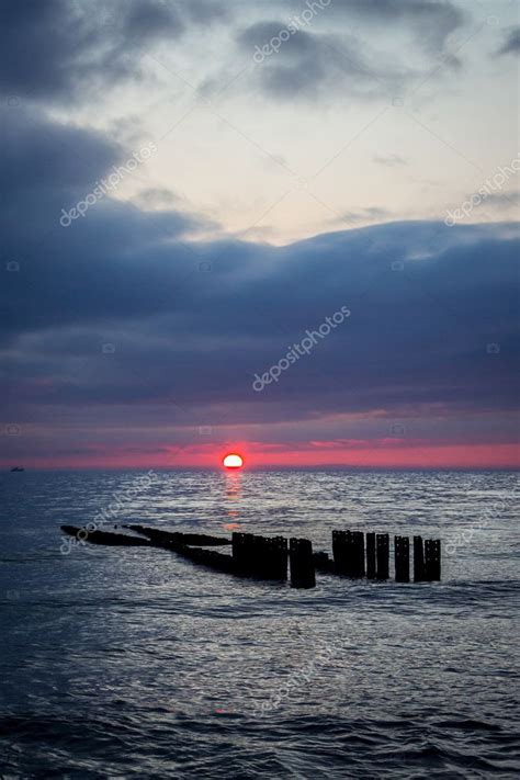 Golden sunset on beach — Stock Photo © samurkas #102478494