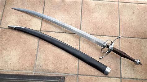 Nice hybrid build of a swiss-style two handed saber, with a Hanwei ...