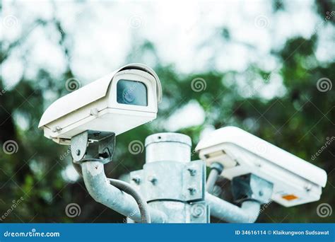 Security camera in park stock photo. Image of circuit - 34616114