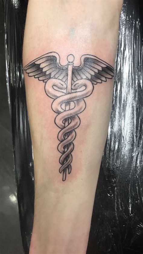 Share 67+ medicine symbol tattoo best - esthdonghoadian