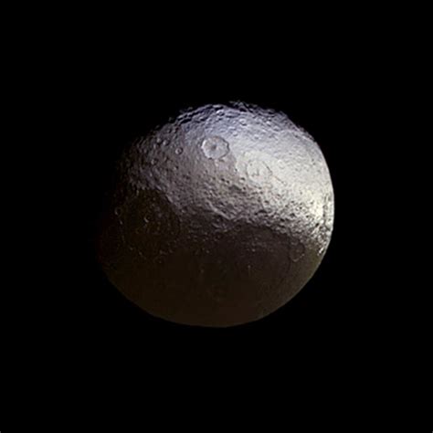 Saturn's two-faced moon Iapetus | Today's Image | EarthSky