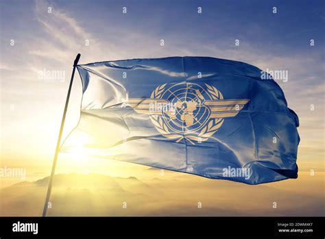 International Civil Aviation Organization ICAO flag waving on the top Stock Photo - Alamy