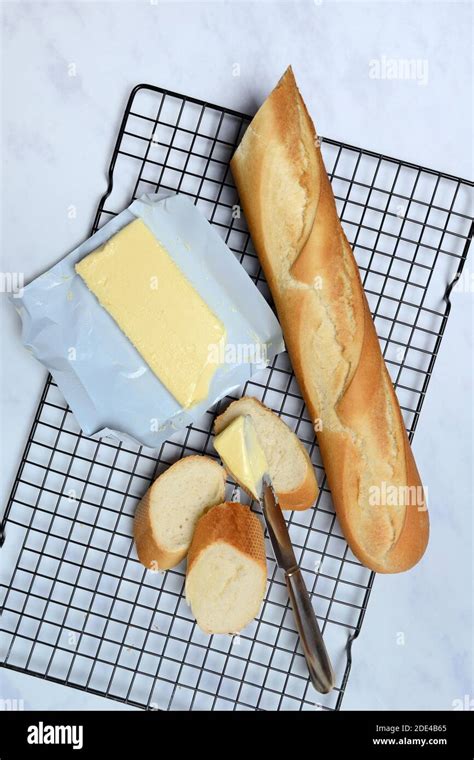 Baguette, baguette slices and butter, Germany Stock Photo - Alamy