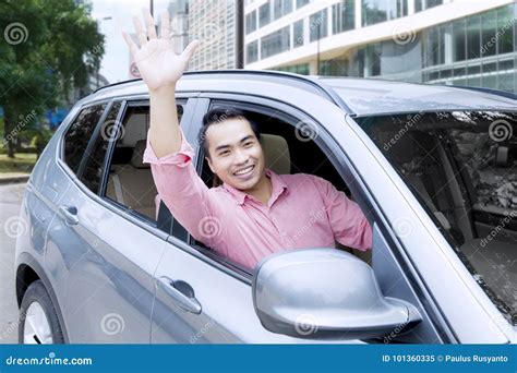 Man Waving Hand on a New Car Stock Image - Image of male, chinese: 101360335