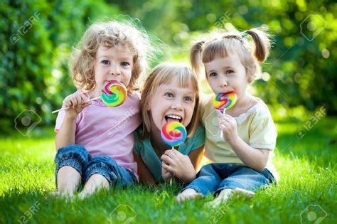 Child Eating Candy Stock Photos, Pictures, Royalty Free Child ... | National day calendar, Happy ...