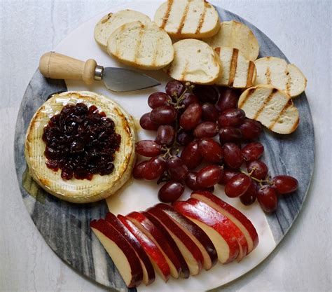 Baked Brie With Honey and Dried Cranberries - AnotherTablespoon