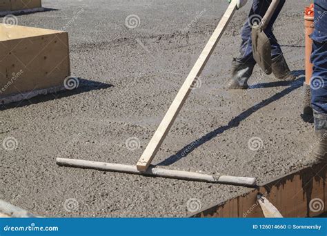 Worker Leveling Fresh Concrete Slab with Special Working Tool Stock Photo - Image of level ...