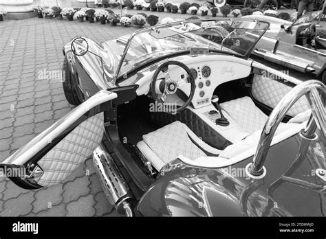 Kyiv, Ukraine - November 02, 2022: AC shelby Cobra convertible sport car interior, open door ...