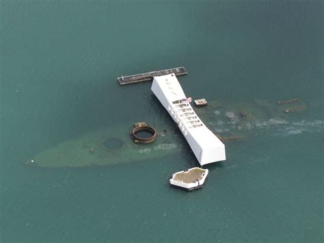 Surviving crew-member interred on wreck of the USS Arizona, 76 years after attack on Pearl ...