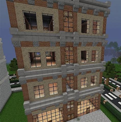 a very large building with lots of windows in the front and side walls that are made out of bricks