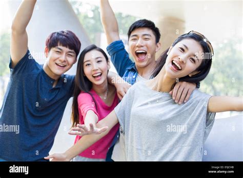 Happy young friends Stock Photo - Alamy