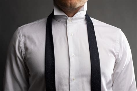 How to Tie a Four In Hand Knot (Step-By-Step Guide) - The Modest Man