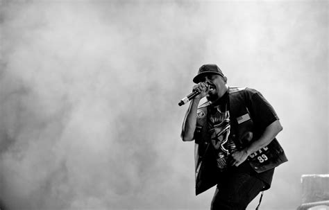Grayscale photography of a man wearing vest and t-shirt on stage singing HD wallpaper ...
