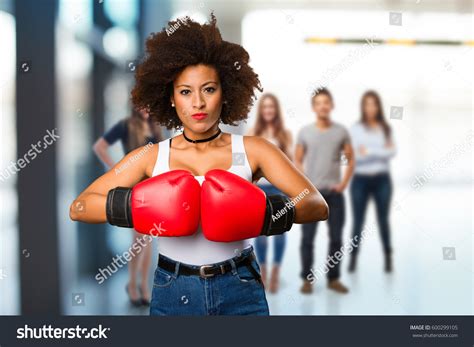 Young Black Woman Using Boxing Gloves Stock Photo 600299105 | Shutterstock