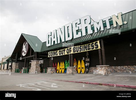 A "Going Out Of Business" banner at a Gander Mountain retail store in ...