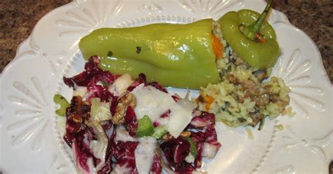 Cubanelle peppers stuffed with typical Italian ingredients like Italian sausage, Arborio rice ...