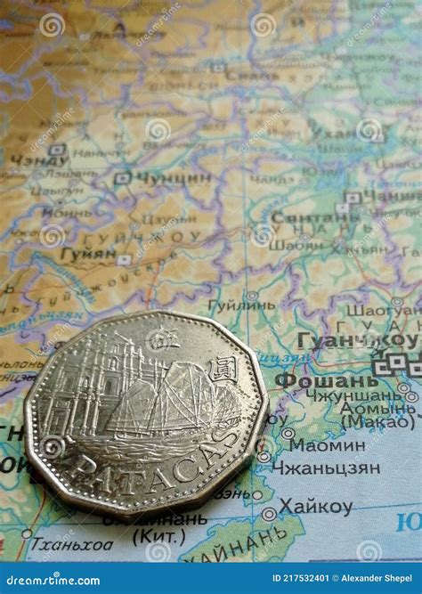 Coin on a geographic map stock image. Image of geography - 217532401