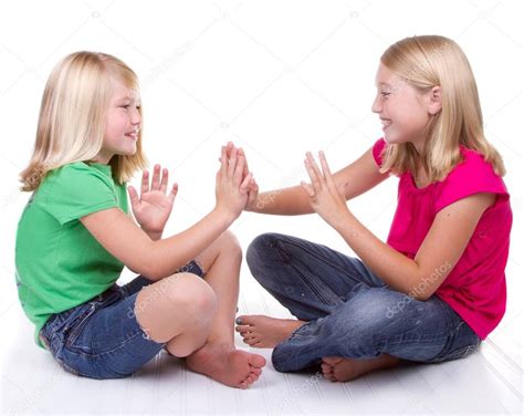 Girls playing clapping game — Stock Photo © sjhuls #12381988