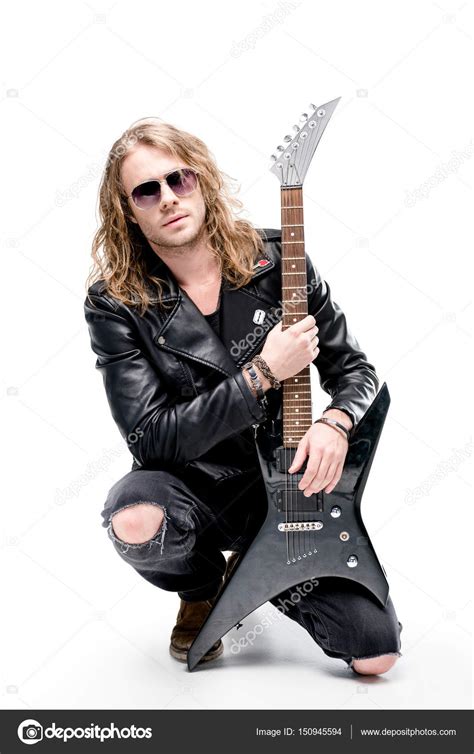 Rocker with electric guitar — Stock Photo © DmitryPoch #150945594