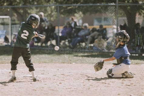 Two Children Playing Baseball Picture. Image: 110796410