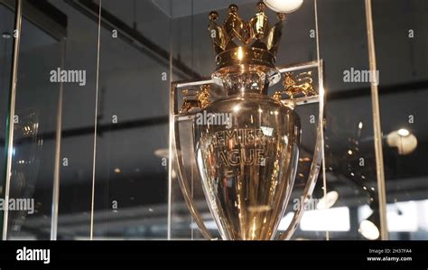 Close-up of beautiful golden Premier League Trophy standing behind the ...